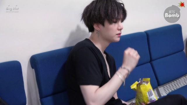 SUGA is eating snack