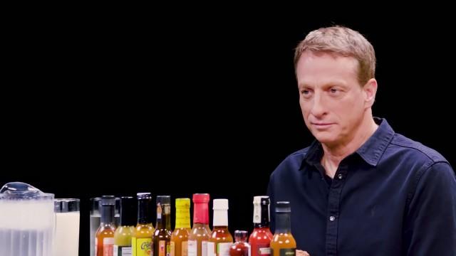 Tony Hawk Embraces the Pain While Eating Spicy Wings