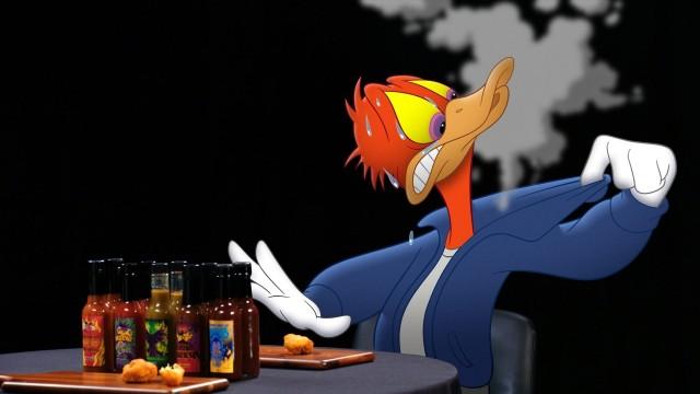 Donald Duck Tries to Keep His Cool While Eating Spicy Wings