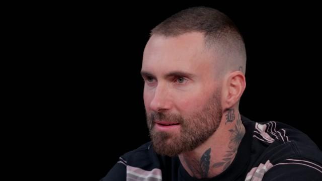 Adam Levine Gives a Halftime Speech While Eating Spicy Wings