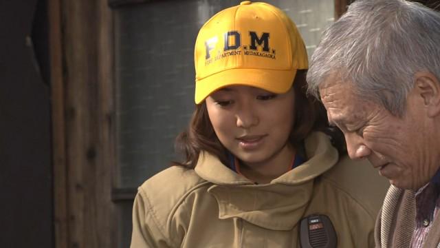 猛火に突進した女