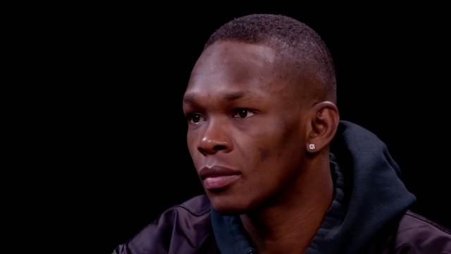 Israel Adesanya Gives Thanks While Eating Spicy Wings