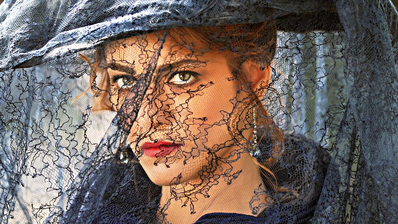 The Lady with the Black Veil